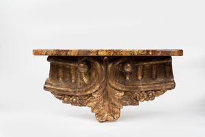  - Carved and gilded wooden shelf with faux marble top
