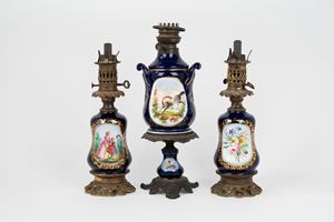 Pair of blue and bronze porcelain lamps and single lamp, 19th century