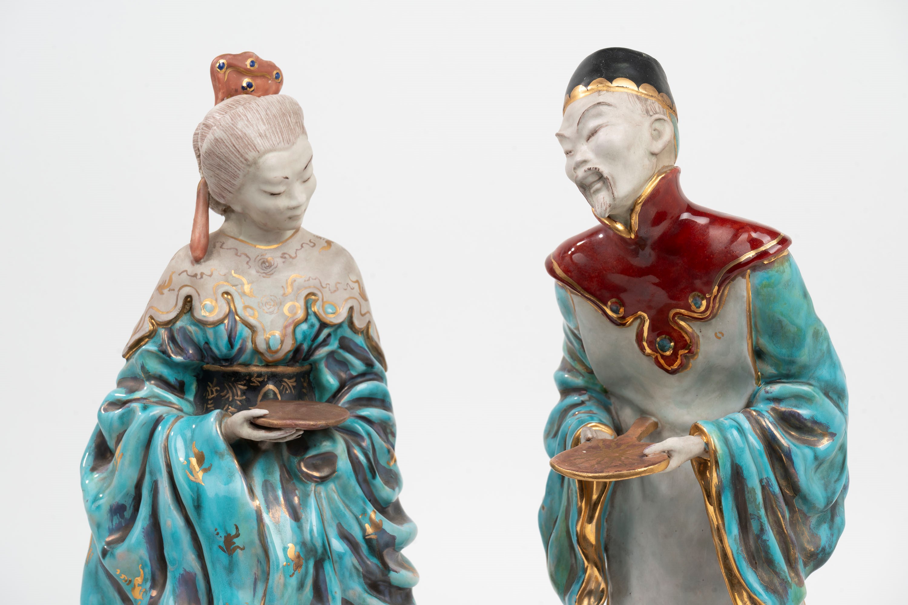 Due Sculture in Terracotta Policroma Raffiguranti Coppia Orientale,