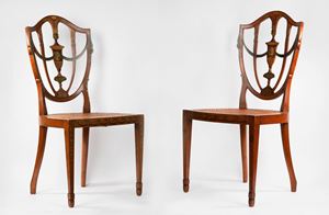Pair of carved and painted wooden chairs, with Vienna straw seat, England, late 18th century