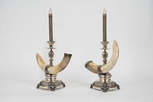  - Pair of silver candlesticks with warthog teeth, 20th century