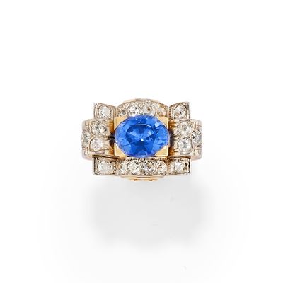 Anello in oro bicolore 18k con zaffiro sintetico ovale e diamanti