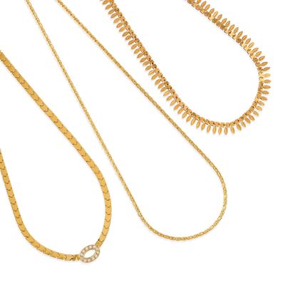 Tre collane in oro giallo 18k con decorazioni in pietre incolori