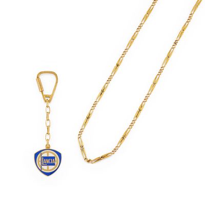 Lotto di gioielli in oro giallo 18k, portachiavi Lancia con smalto e catena da orologio