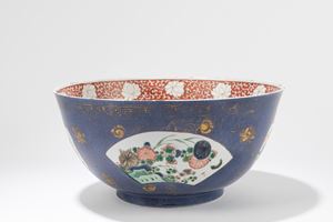 A 'POWDER-BLUE-GROUND' FAMILLE VERTE PORCELAIN PUNCH BOWL