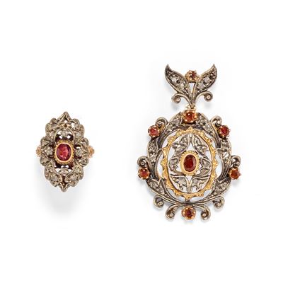 Pendente e anello con rubini e diamanti in argento e oro giallo 18k