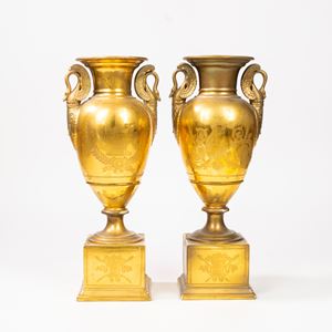 Pair of Empire two-handled vases in gold porcelain