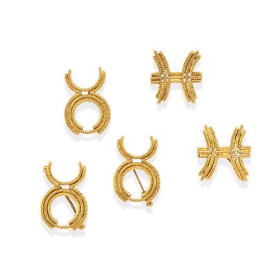 Tre spille e due pendenti in oro giallo 18k