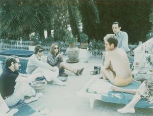 Pierre Berge, Yves Saint Laurent, Clara Saint, Fred Hughes, and Man in Swimsuit