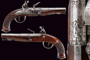 An interesting pair of flintlock pistols with beautiful mounts