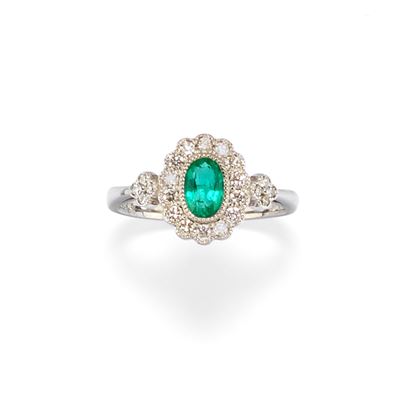 Anello in platino con smeraldo e diamanti