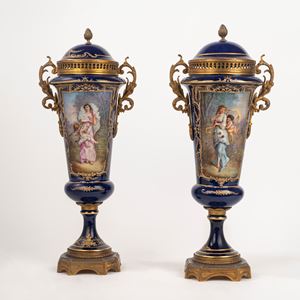 Pair of Sevres porcelain vases with lids with gilded bronze fittings, 19th century