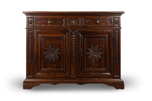 Ancient, finely carved wooden sideboard in Provençal style