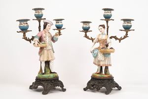 Pair of polychrome porcelain and metal candelabra, 19th century