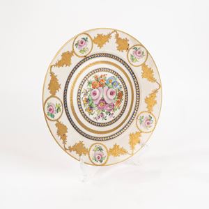 Porcelain plate with flowers and gold decorations, 20th century