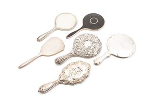 Six silver toilette mirrors