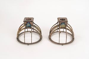 Pair of silver metal candlesticks, Alessi