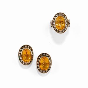 A low-carat two-color gold, silver, quartz and diamond demi parure