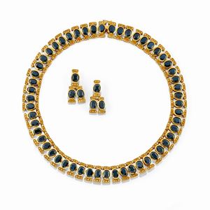 Demi parure in oro giallo 18K