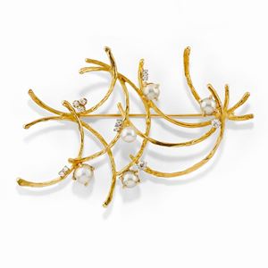 A 18K two-color gold, cultured pearl and diamond brooch