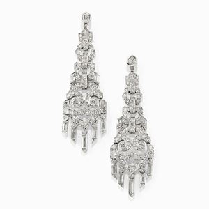 A platinum and diamond pendant earrings