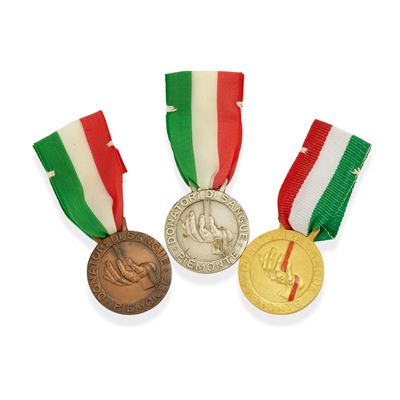 Tre Medaglie, oro giallo 18k, argento 925 e rame