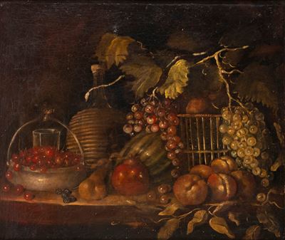 Uve in un Cesto di Vimini e Altri Frutti su un Tavolo