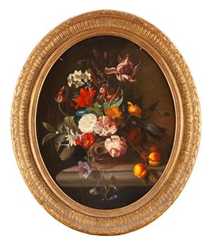 Roses, tulips, daffodils and other flowers in a vase