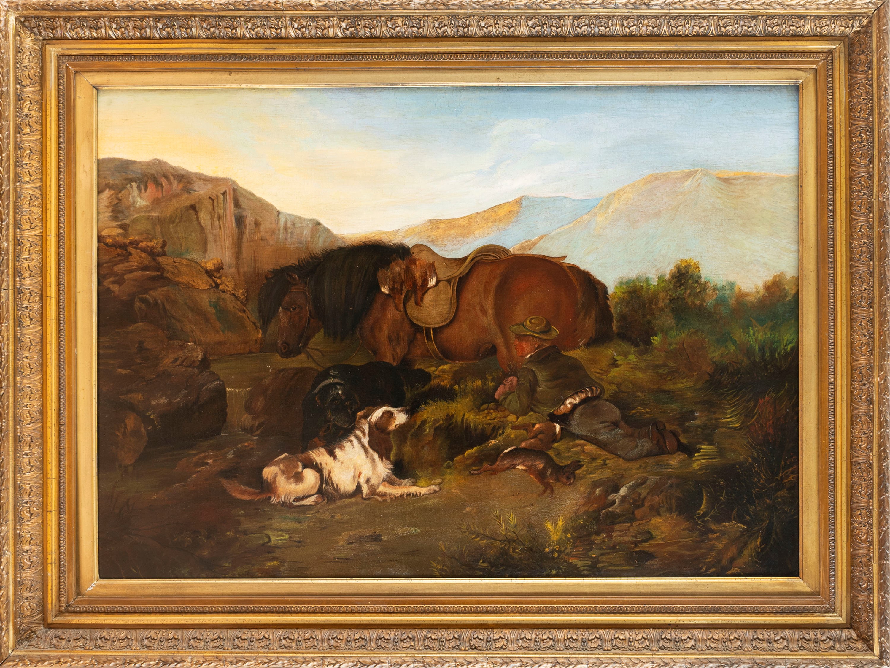 Cacciatore a riposo in un paesaggio