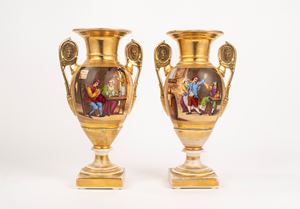 Pair of double-handled Empire vases in polychrome and gilded porcelain, 19th century