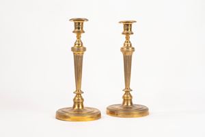 Pair of Empire candlesticks in gilded bronze, early 19th century