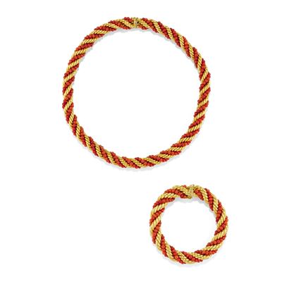 Demi parure in oro giallo 18k con corallo arancione