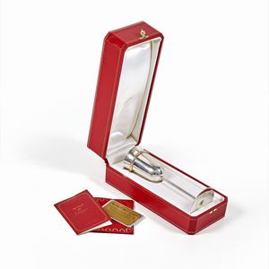 A silver glass, Cartier, with box and warranty