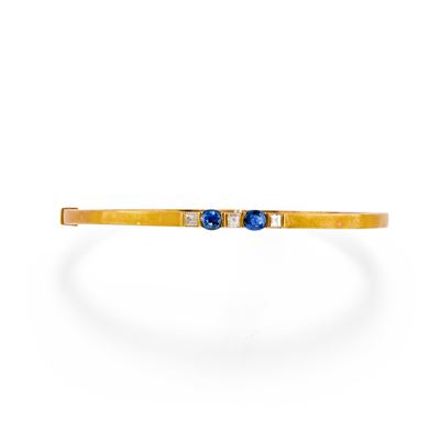 Bracciale rigido in oro giallo 18k con zaffiri e diamanti