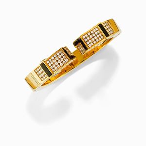 A 18K yellow gold and diamond bangle, Chaumet
