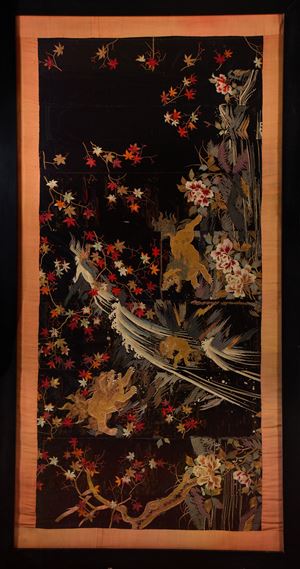 A large framed silk Kimono with buddhist lions