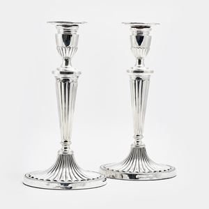 A couple of silver candlesticks, England 20th Century