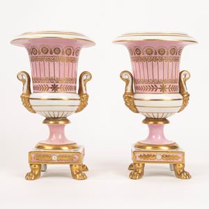 Pair of porcelain vases with feral feet, Empire style