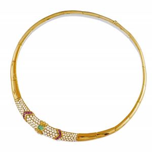 A 18K yellow gold, emerald, ruby and diamond demi parure