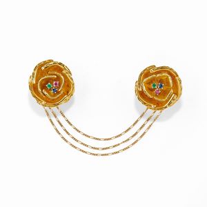 A 18K yellow gold, ruby, emerald and sapphire brooch