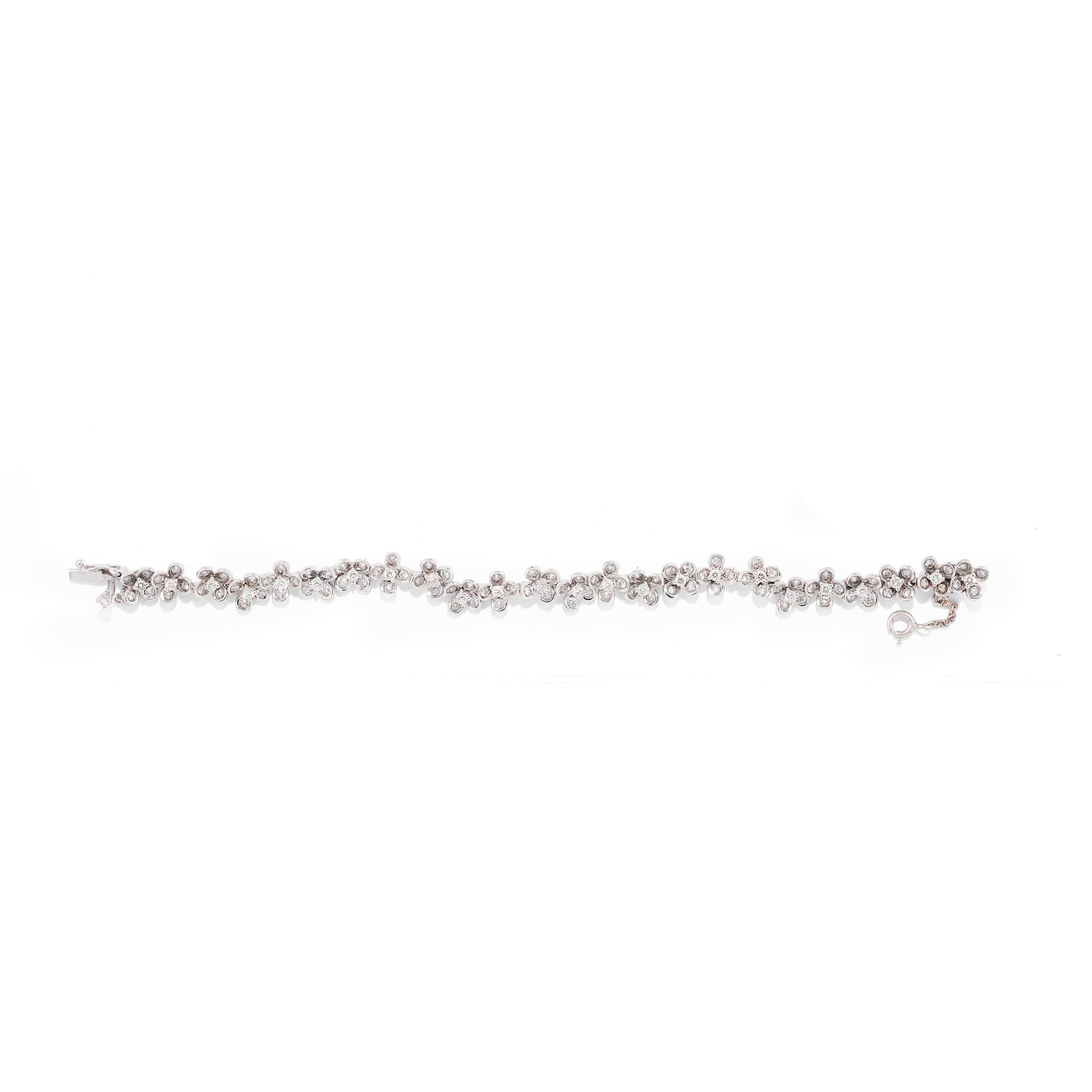 Coppia di Orecchini e Bracciale con Diamanti