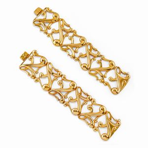 Due bracciali in oro giallo scatolato 18K