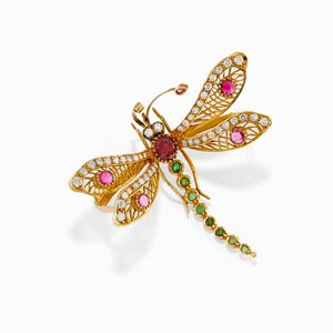 A 18K yellow gold, ruby, emerald and diamond brooch, defects