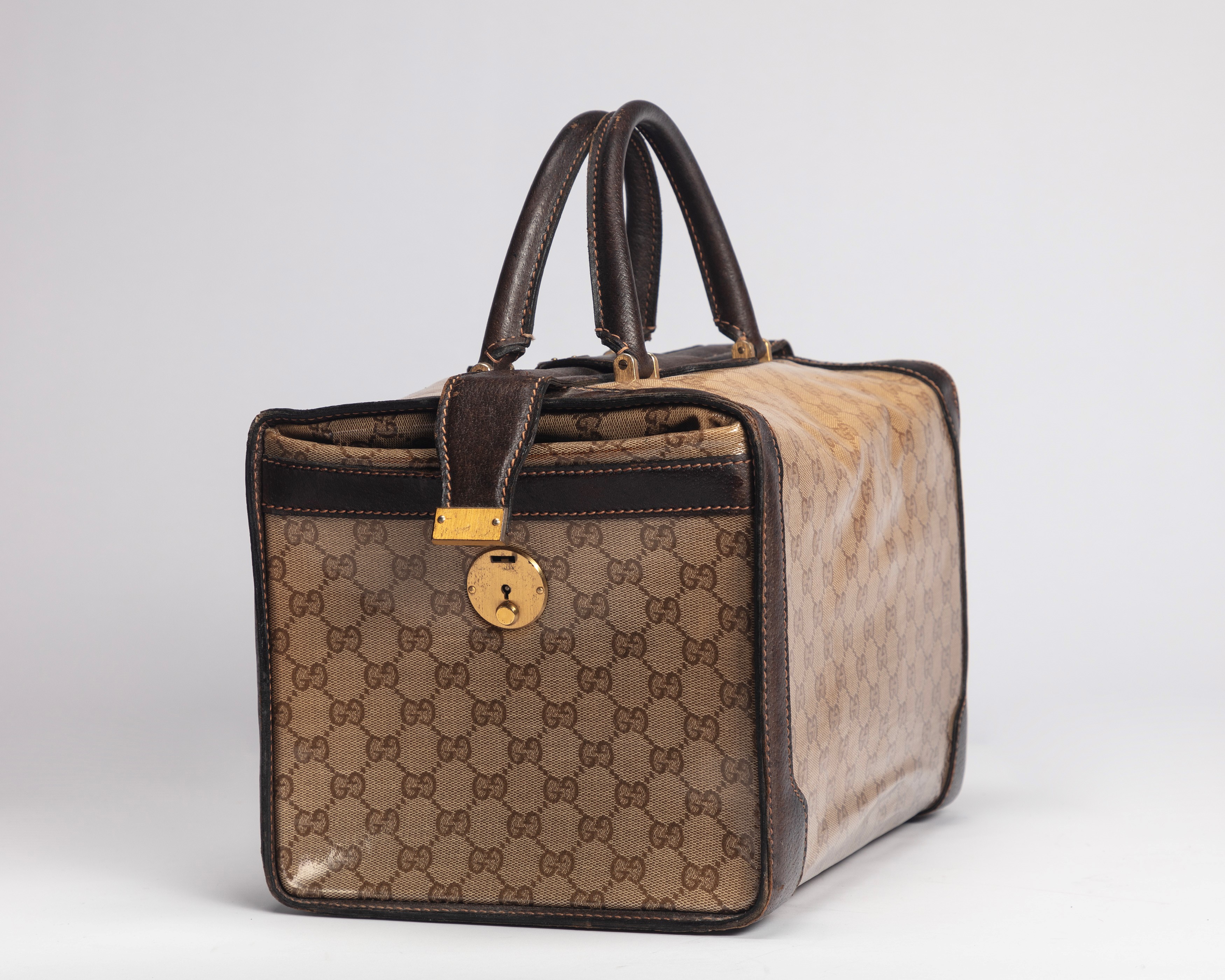 Gucci - Bauletto da viaggio in tela monogrammata con dettagli in pelle di cinghiale