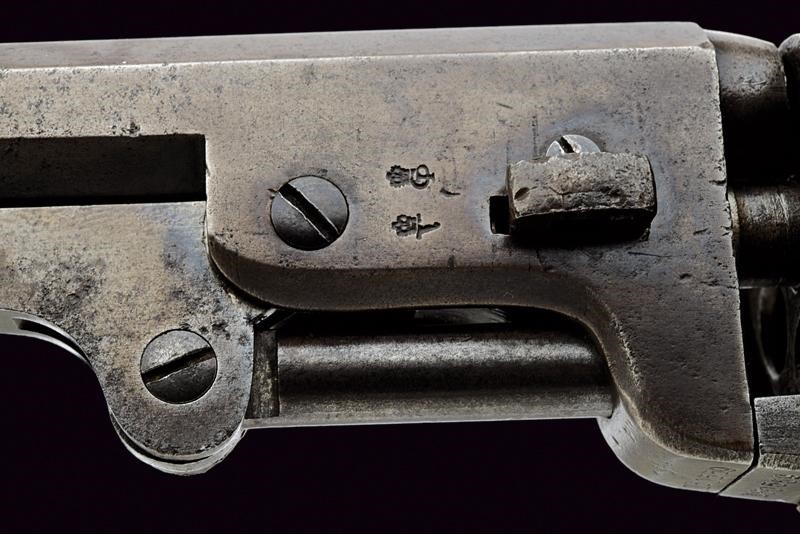A Colt Model 1851 Navy Revolver