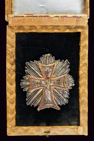 Ordine del Dannebrog, Placca del primo modello in canutiglia argentata con monogramma e iscrizion...