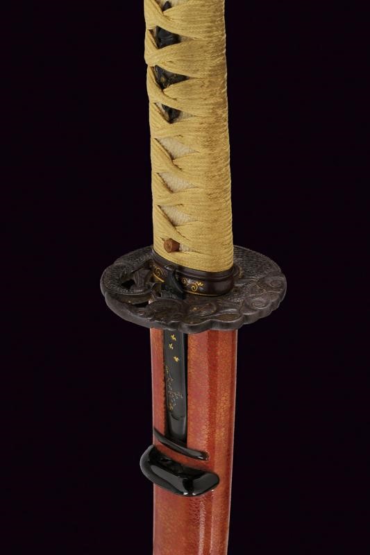 Mutsu no Kami Juji Wara Toshi Naga, Katana firmata con koshirae in ferro e legno laccato