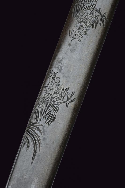 Mototomo, Kozuka con firma e kao, Giappone, Periodo Edo, 9.7 cm