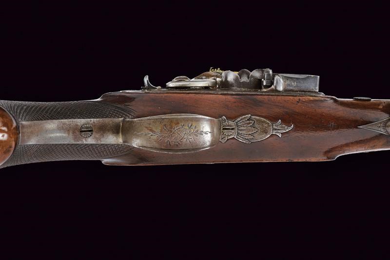 Simpson, Pistola a pietra focaia con cassa in legno