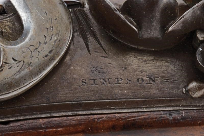 Simpson, Pistola a pietra focaia con cassa in legno